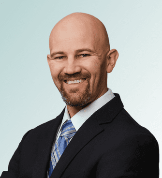 Andrew Stith Johnson man smiling ,wearing a suit and tie