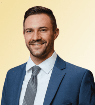 Joseph Lammers man smiling, wearing a tie and suit