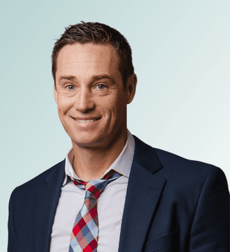 Michael Rusnak Johnson man smiling, wearing a suit