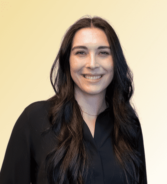 Taylor woman smiling, wearing a black shirt