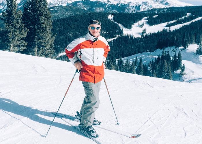 fitzgibbons 2 A man in an orange jacket on skis