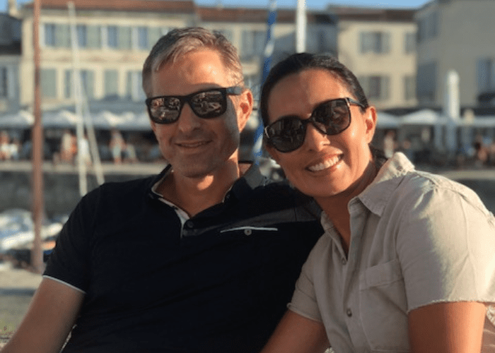 pater 1 A man and woman in sunglasses pose for a picture together