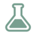 A simple, green icon of a laboratory flask with a wide base and narrow neck, commonly used to represent science or chemistry.