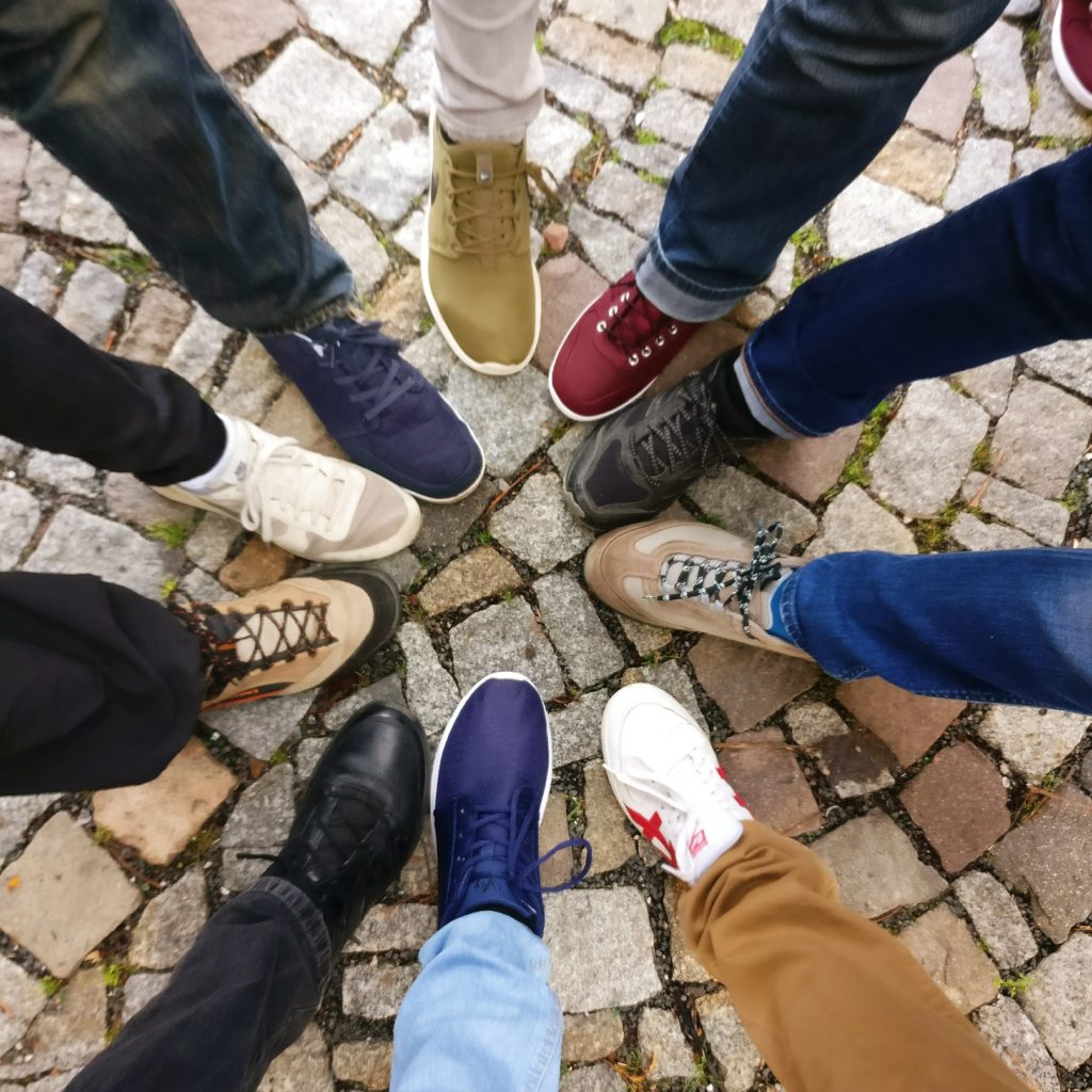 Shoe Circle People in a circle showing their different shoes