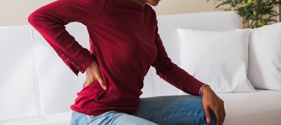 OCR Blog Template (700 × 500 px) woman grabbing back in pain