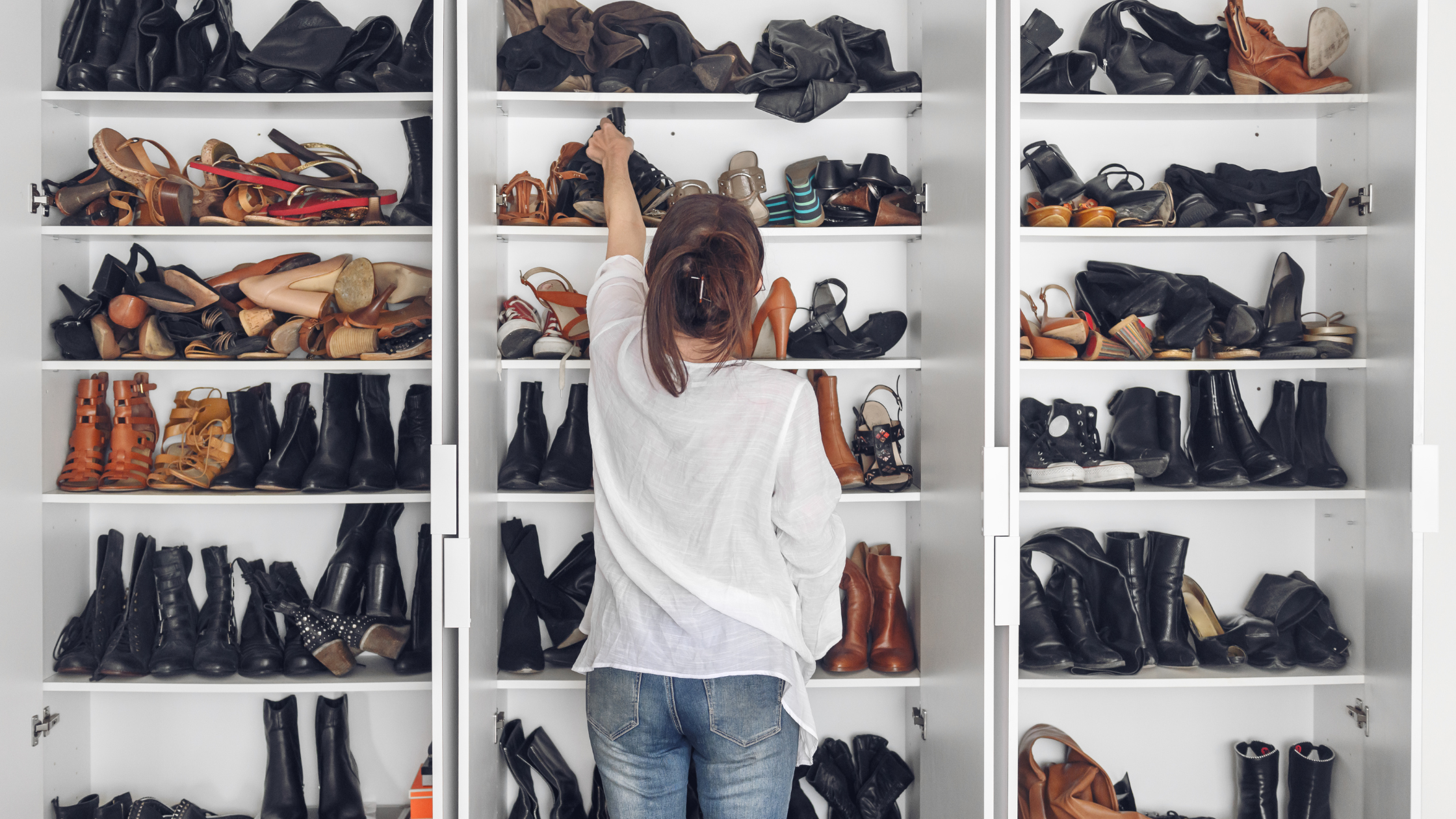 woman in a shoe closet shoes for foot pain